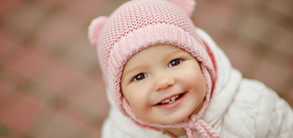 Baby in pink hat